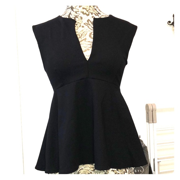 bebe Tops - Bebe low-cut peplum Top bebe Tops - Bebe low-cut peplum Top